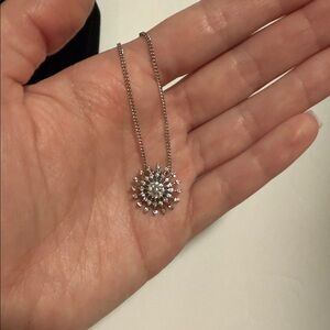 Elegant Silver Sunburst Pendant Necklace